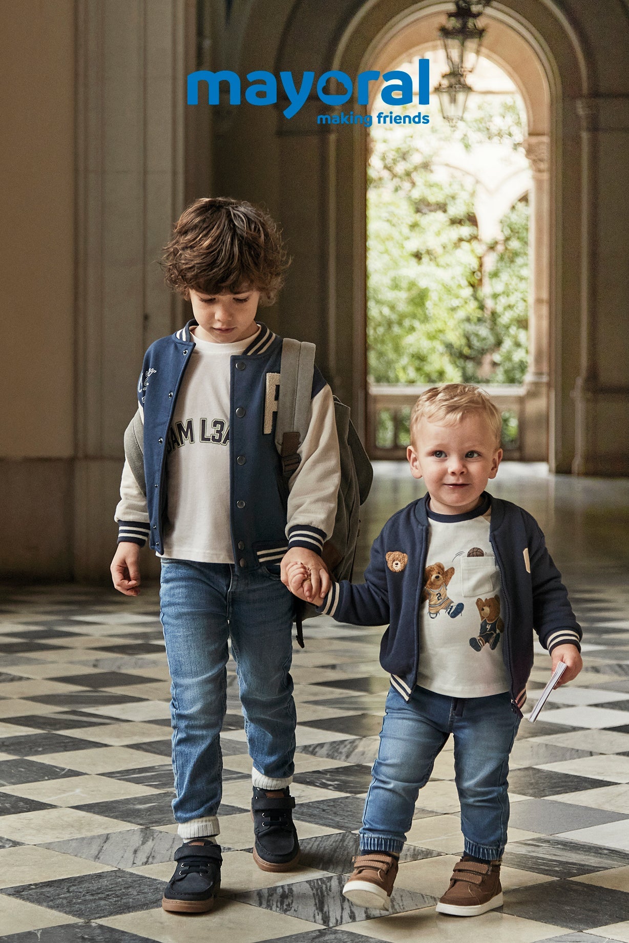 Mayoral striped brightly coloured summer dress with tie style straps.