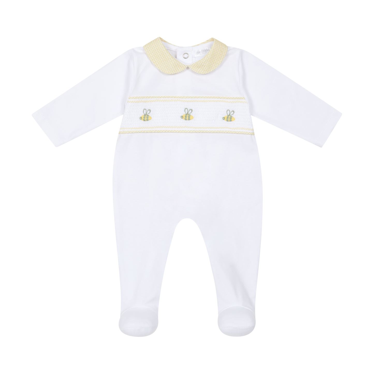 White baby onesie with yellow trim and embroidered details on a white background
