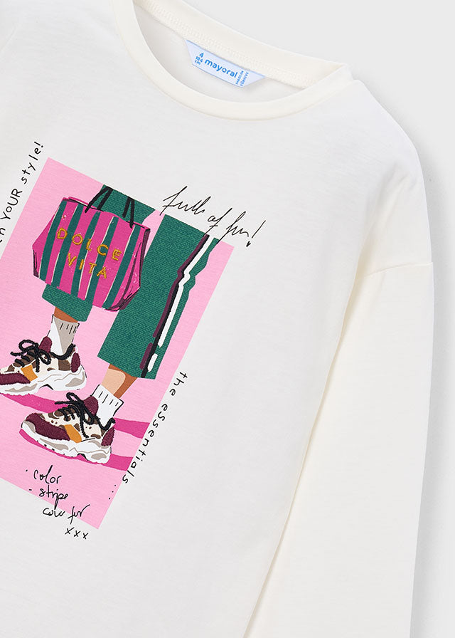 White sweatshirt with a colorful graphic of a person in green pants and pink shoes on a pink background.