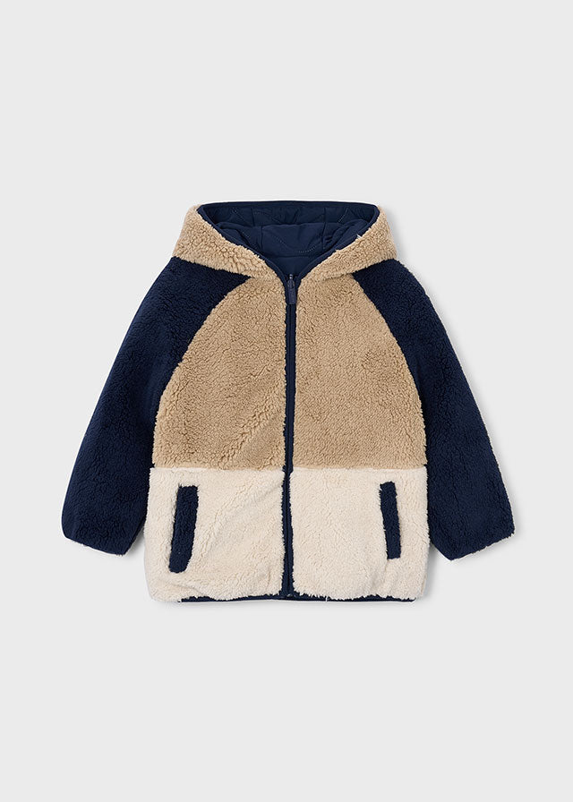 Children's fleece jacket with color-blocked design on a light gray background