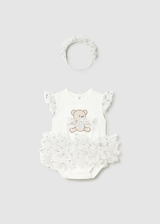 Baby romper with teddy bear design and matching headband on a light gray background