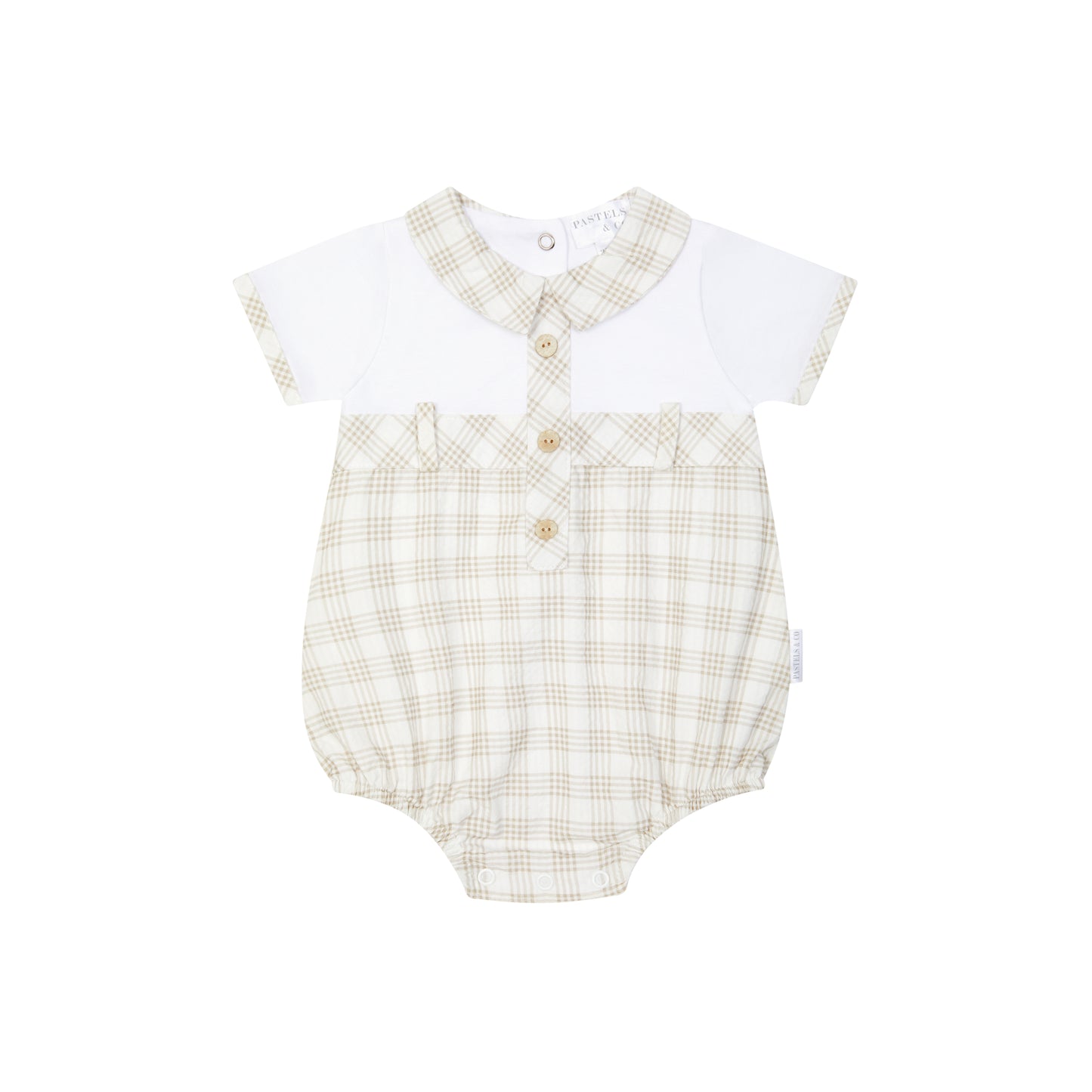 Baby romper with checkered design and white shirt on a white background