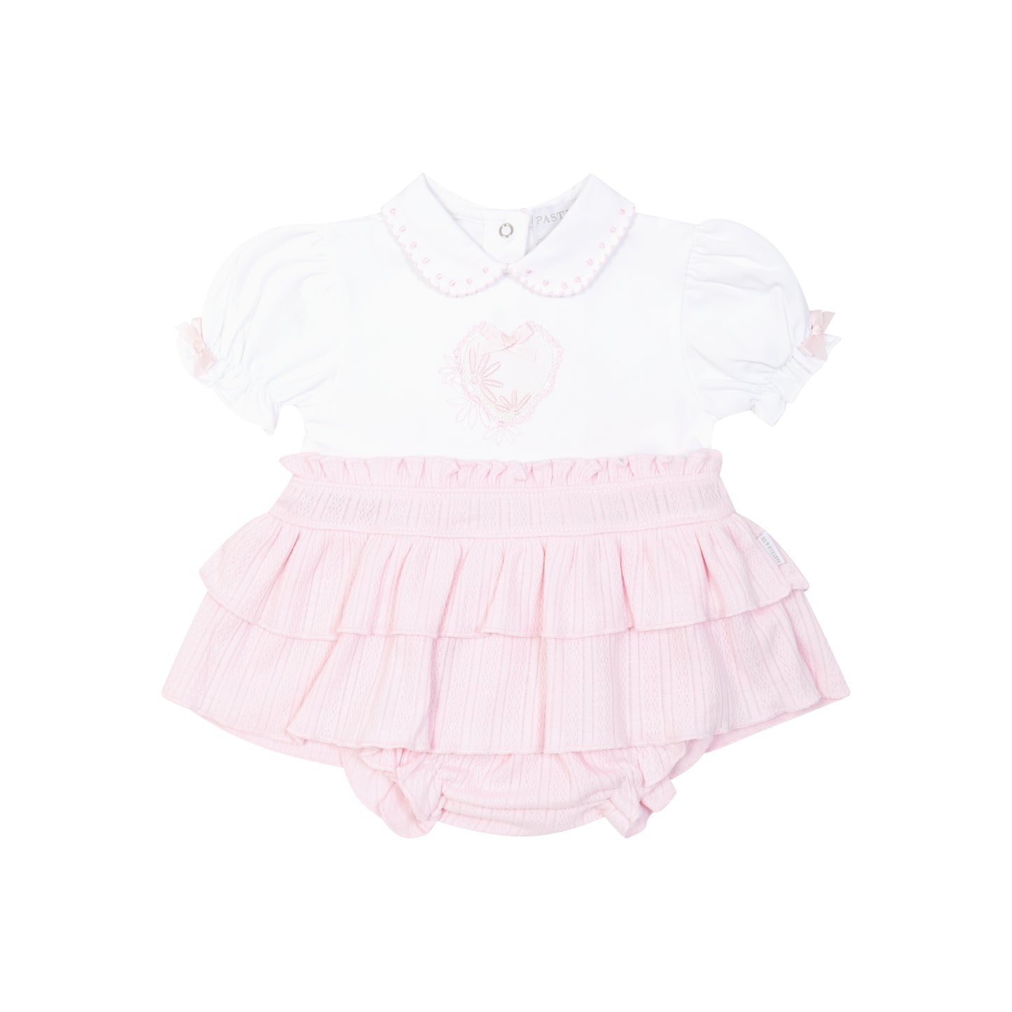 Pink baby romper with white top on a white background