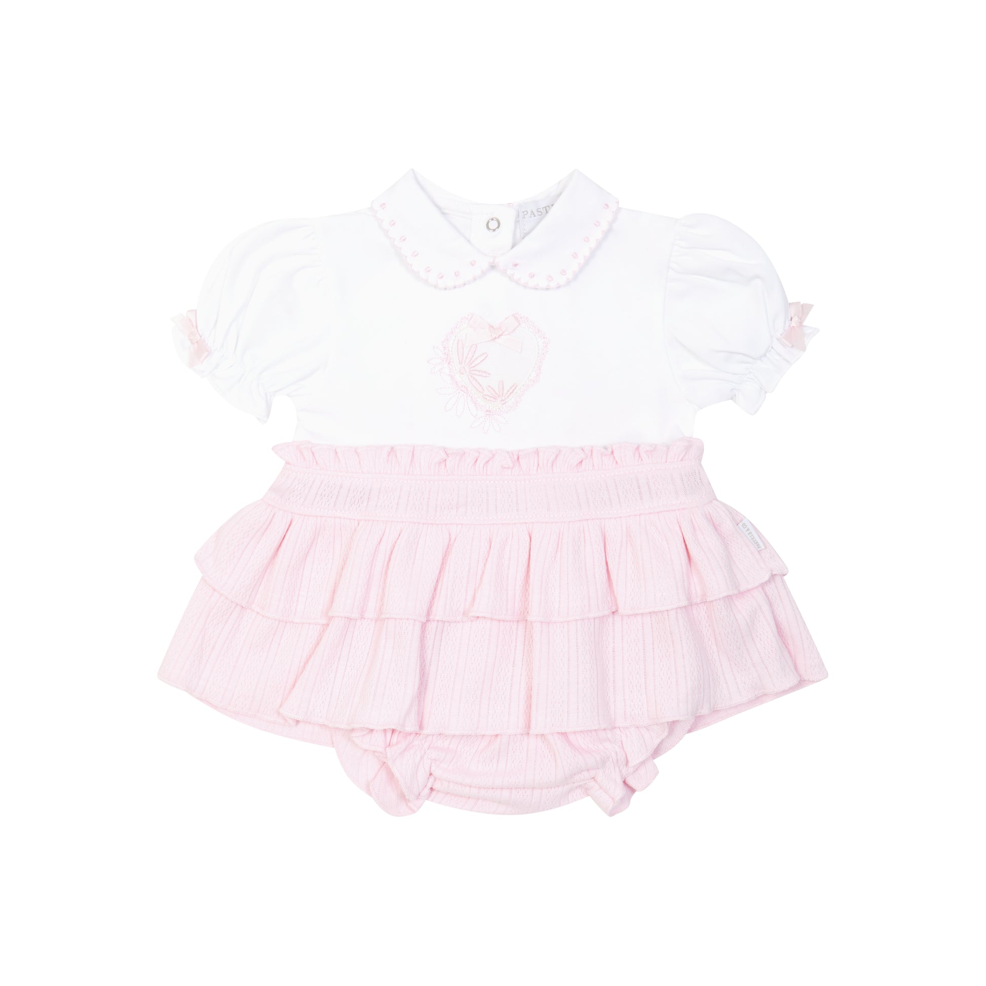 Pink baby romper with white top on a white background