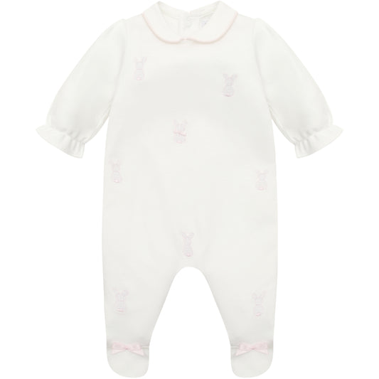 White baby onesie with pink trim on a white background