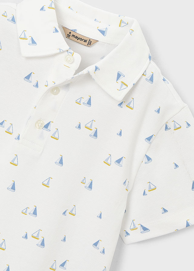 White shirt with sailboat pattern and Mayoral label on a white background