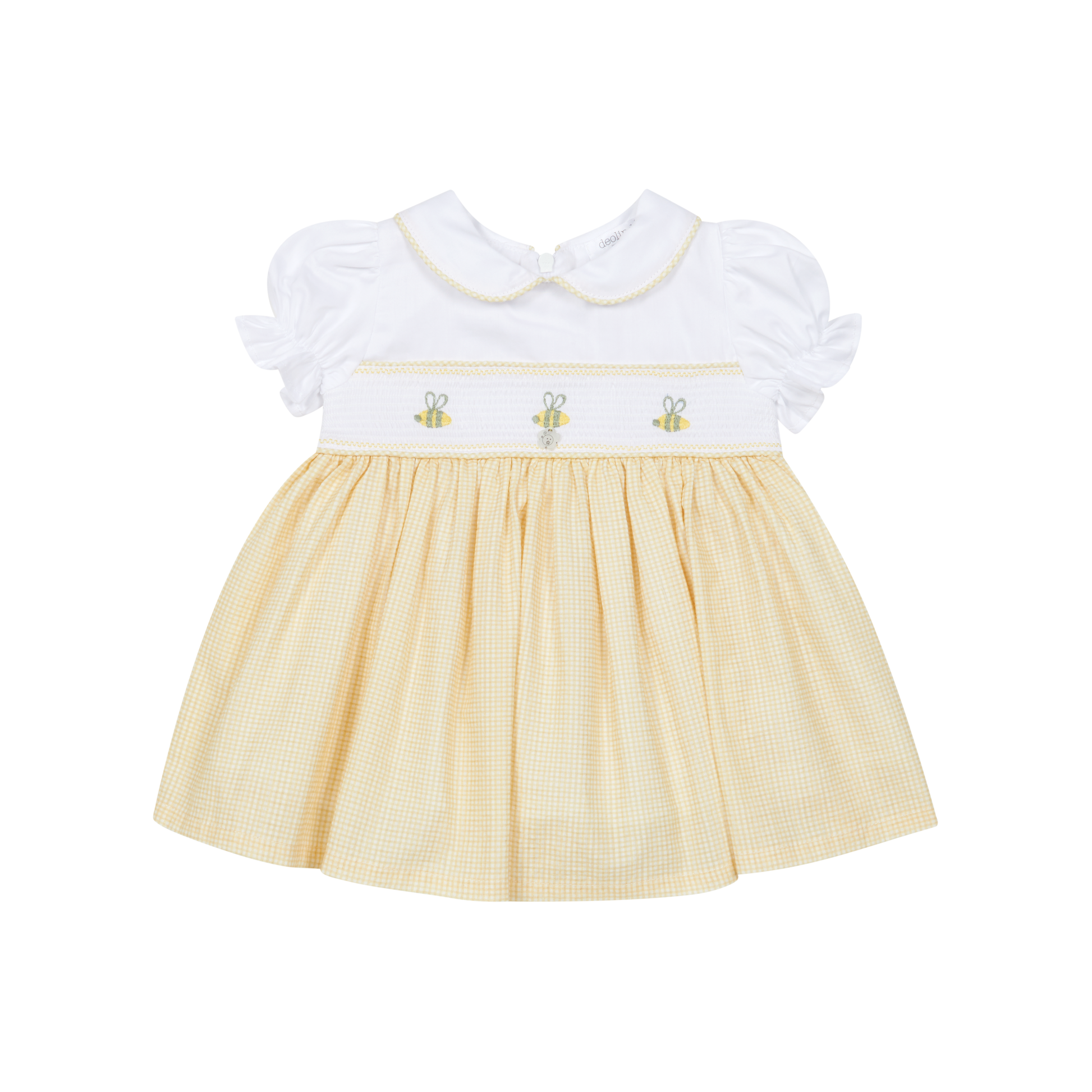 Yellow dress with white ruffled collar on a white background