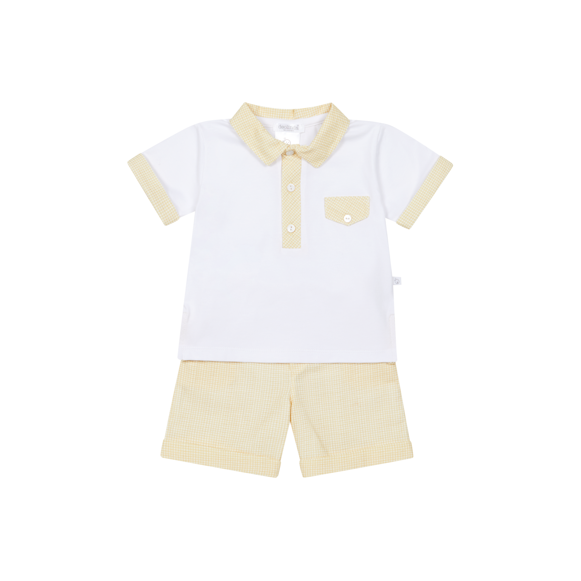 White polo shirt with beige collar and shorts on a white background