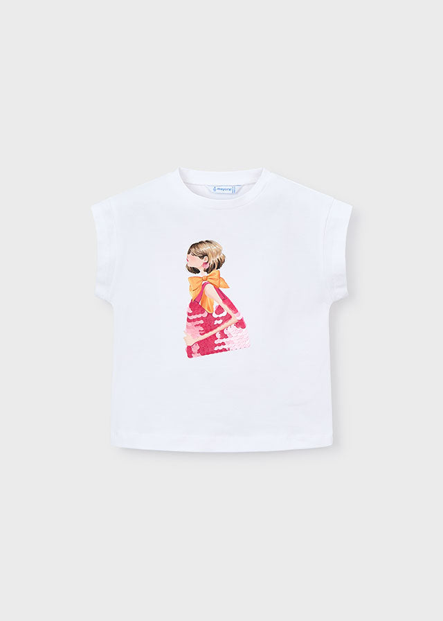 White t-shirt with a colorful graphic of a woman on a light beige background